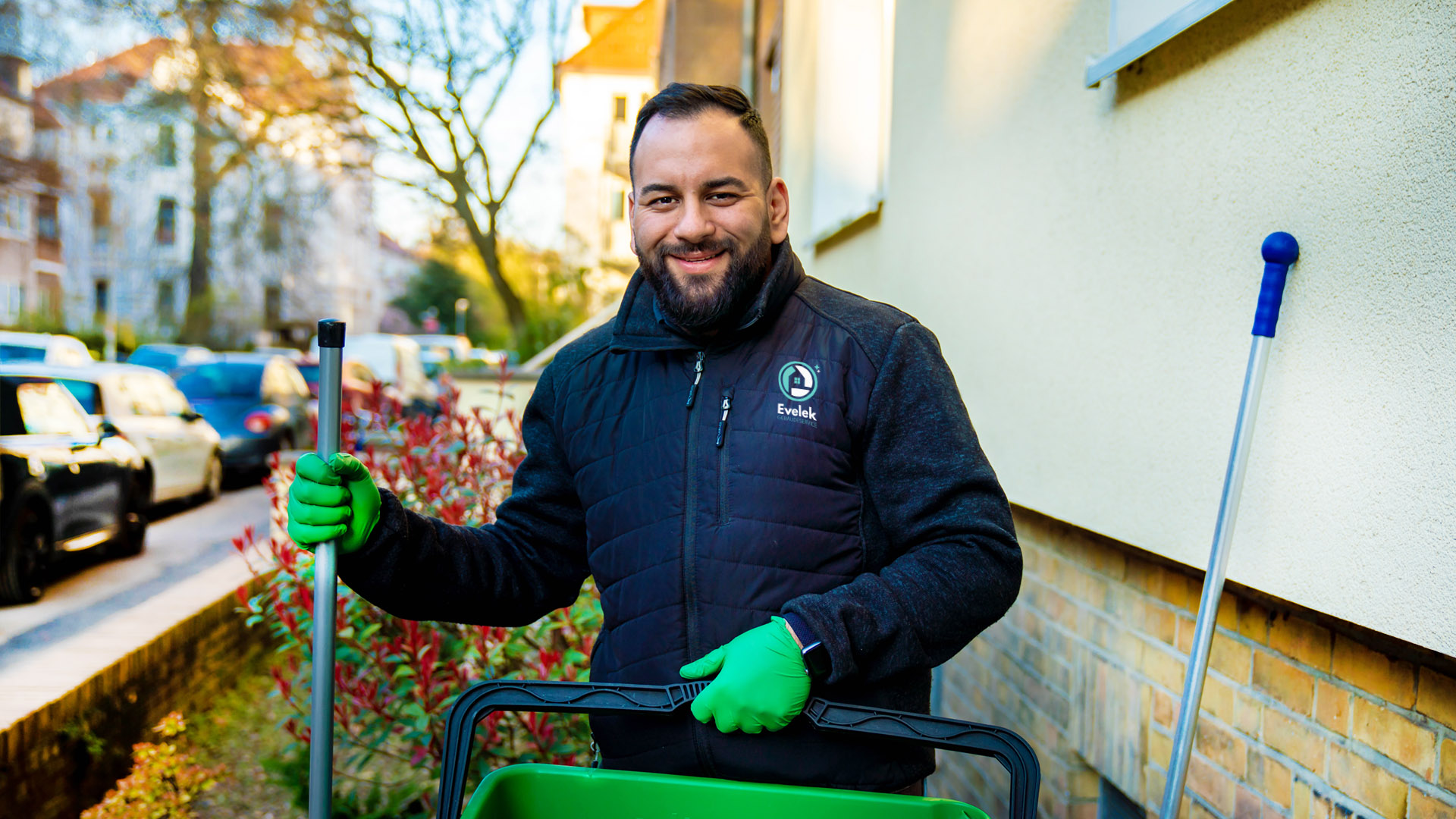 Person Cleaning Carpet With Vacuum Cleaner